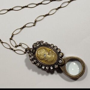 Magnifying Glass Bronze Tone Rhinestone Cameo on MOP Shell Loupe Pendant